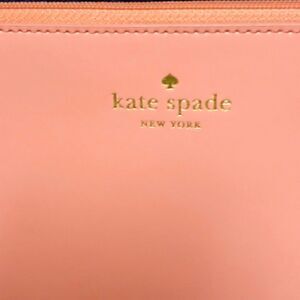 KATE SPADE Top Zippered Wristlet. Pink/Salmon
